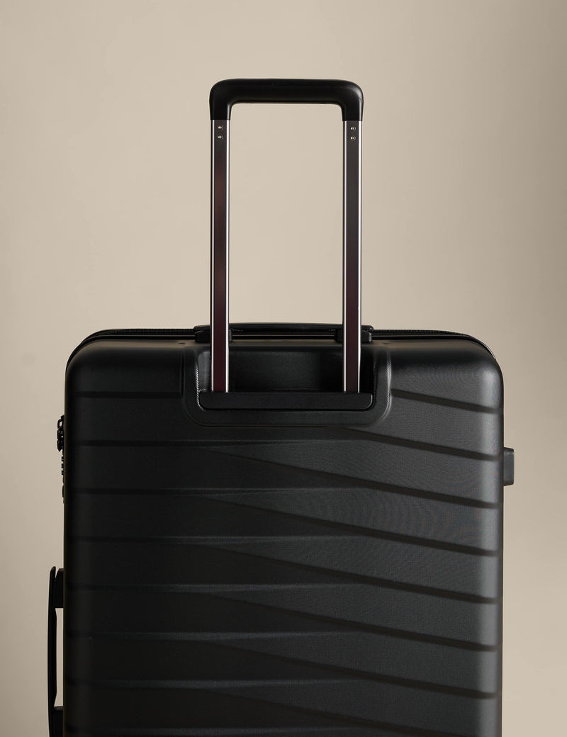 Oslo large hard shell suitcase with 4 wheels (British brand)