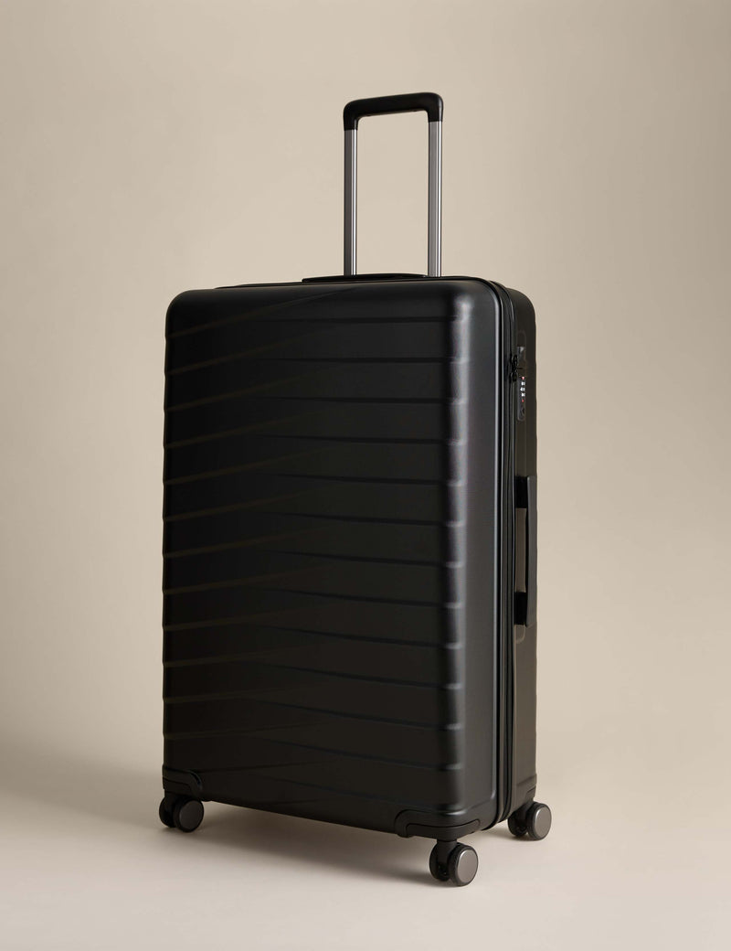 Oslo large hard shell suitcase with 4 wheels (British brand)