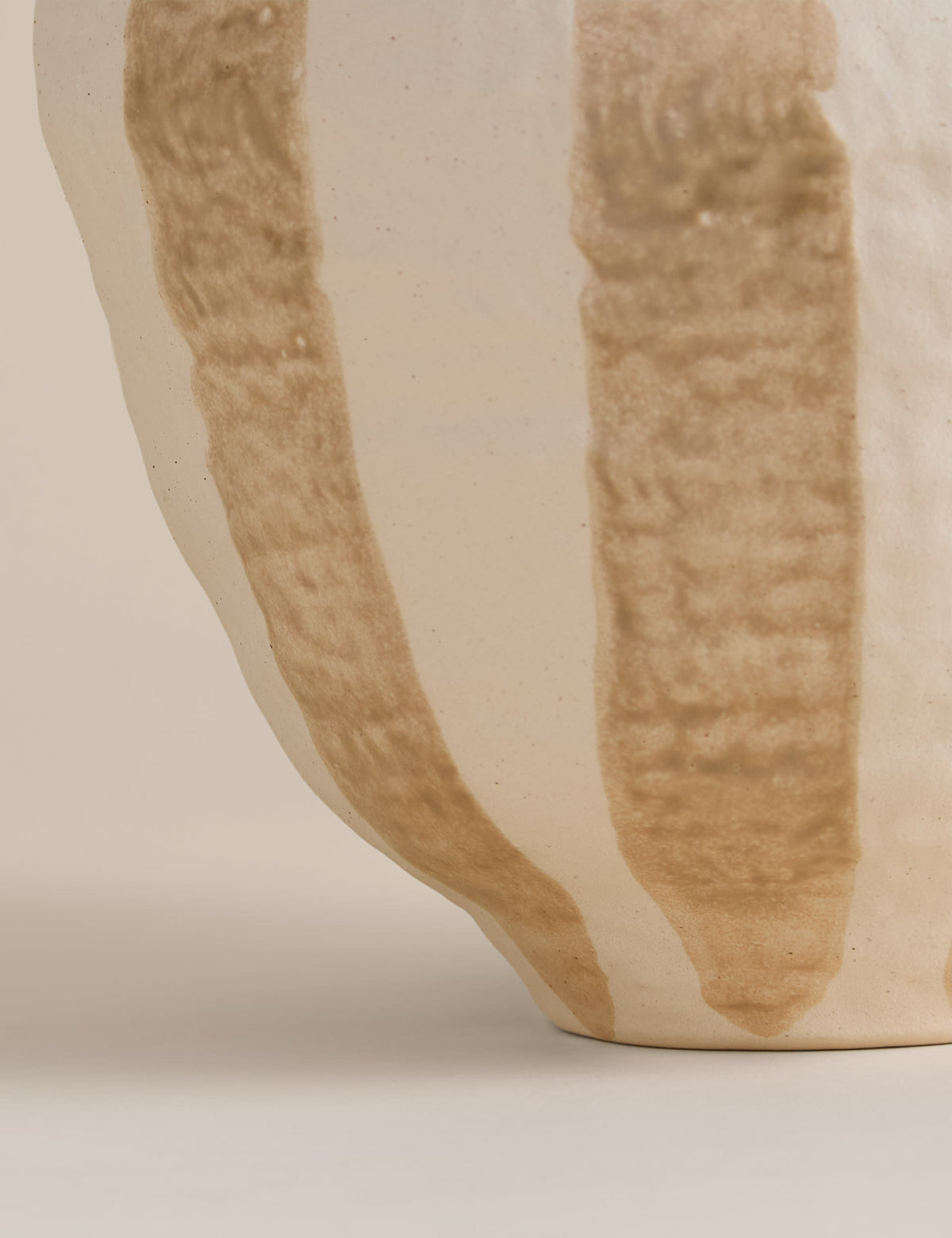 Striped ceramic vase with hand-painted pattern, UK version