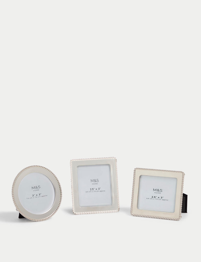 Set of three silver photo frames with square, rectangular, and circular shapes (British brand)