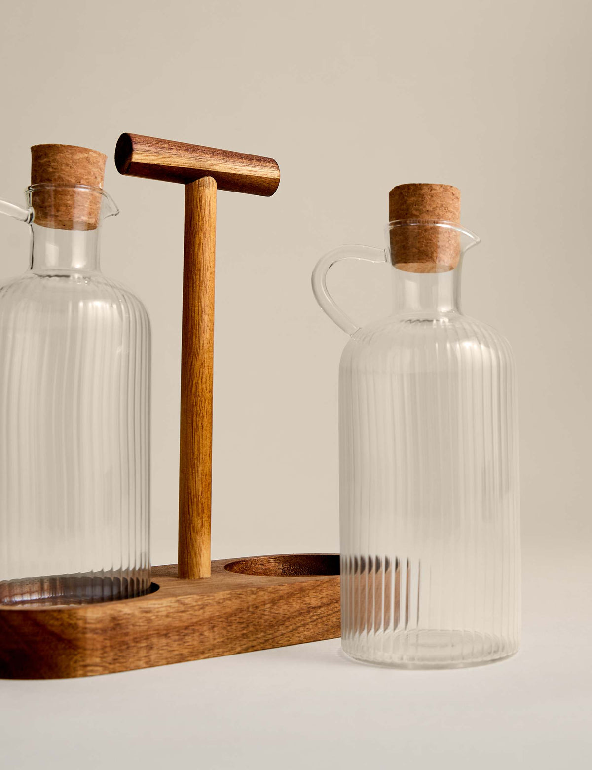 Glass oil pourers set of two with acacia wood caddy (British brand)