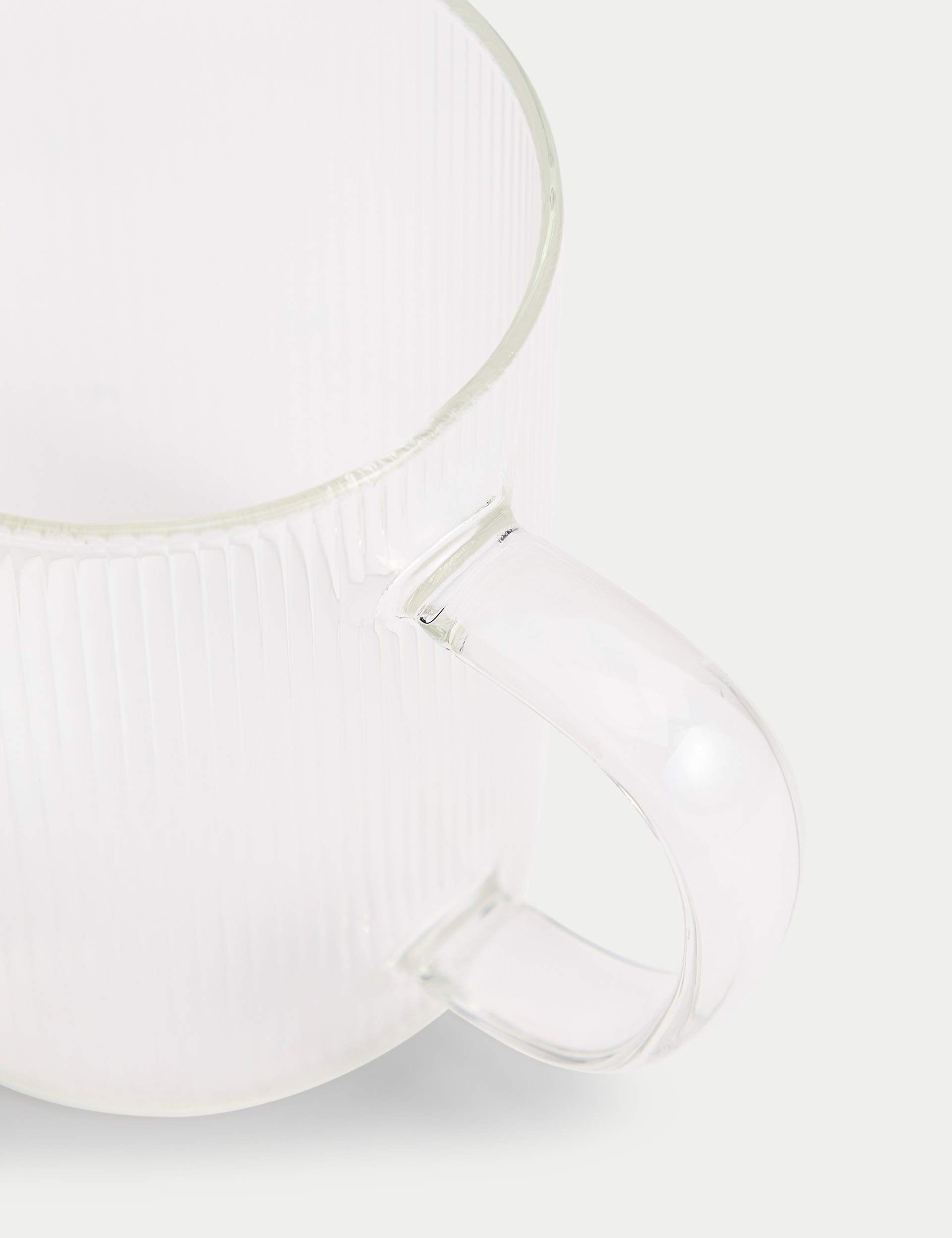 Ribbed glass milk jug, imported from the UK
