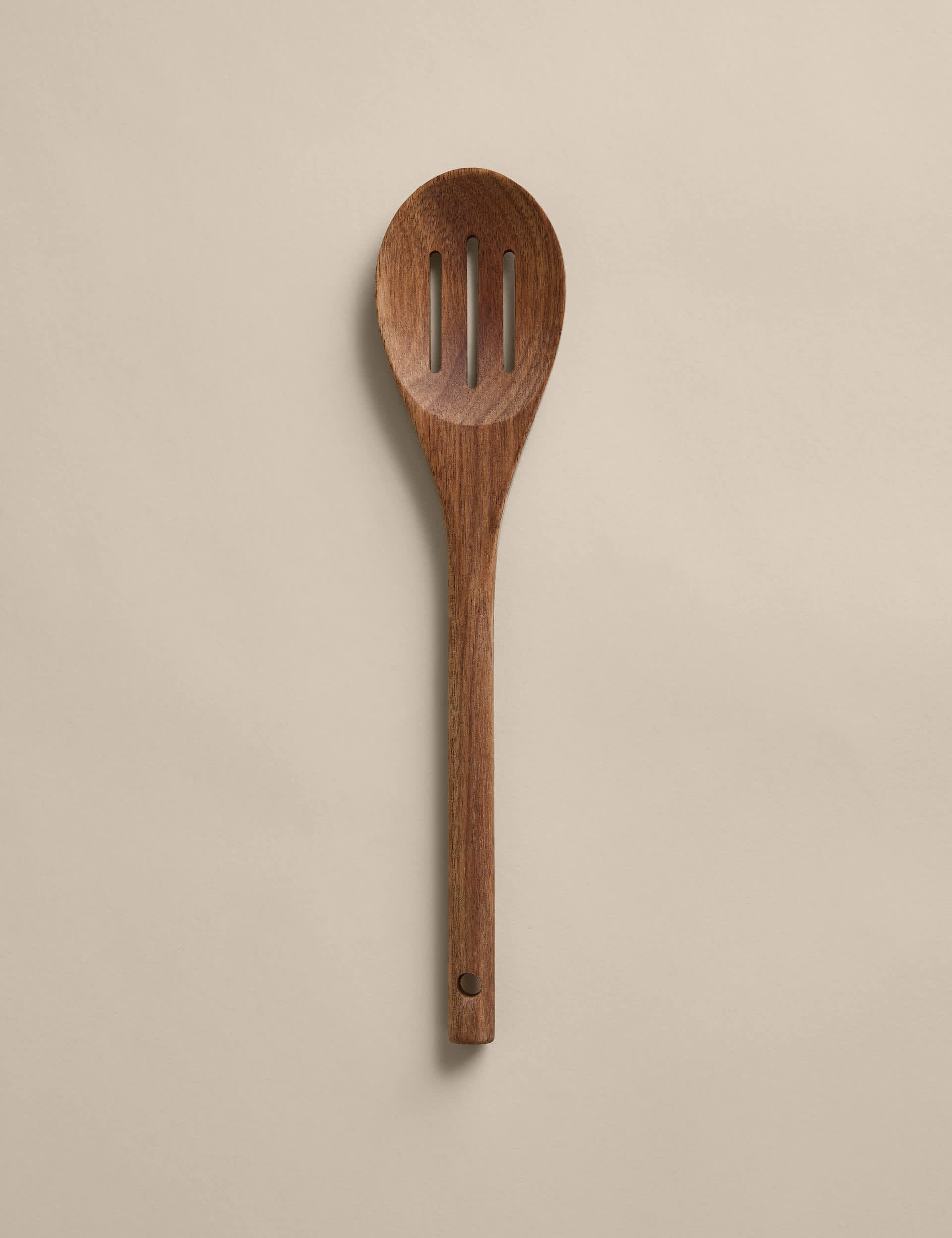 Wooden slotted spoon (British brand)