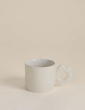 Stoneware mug with a flower-shaped handle - British product