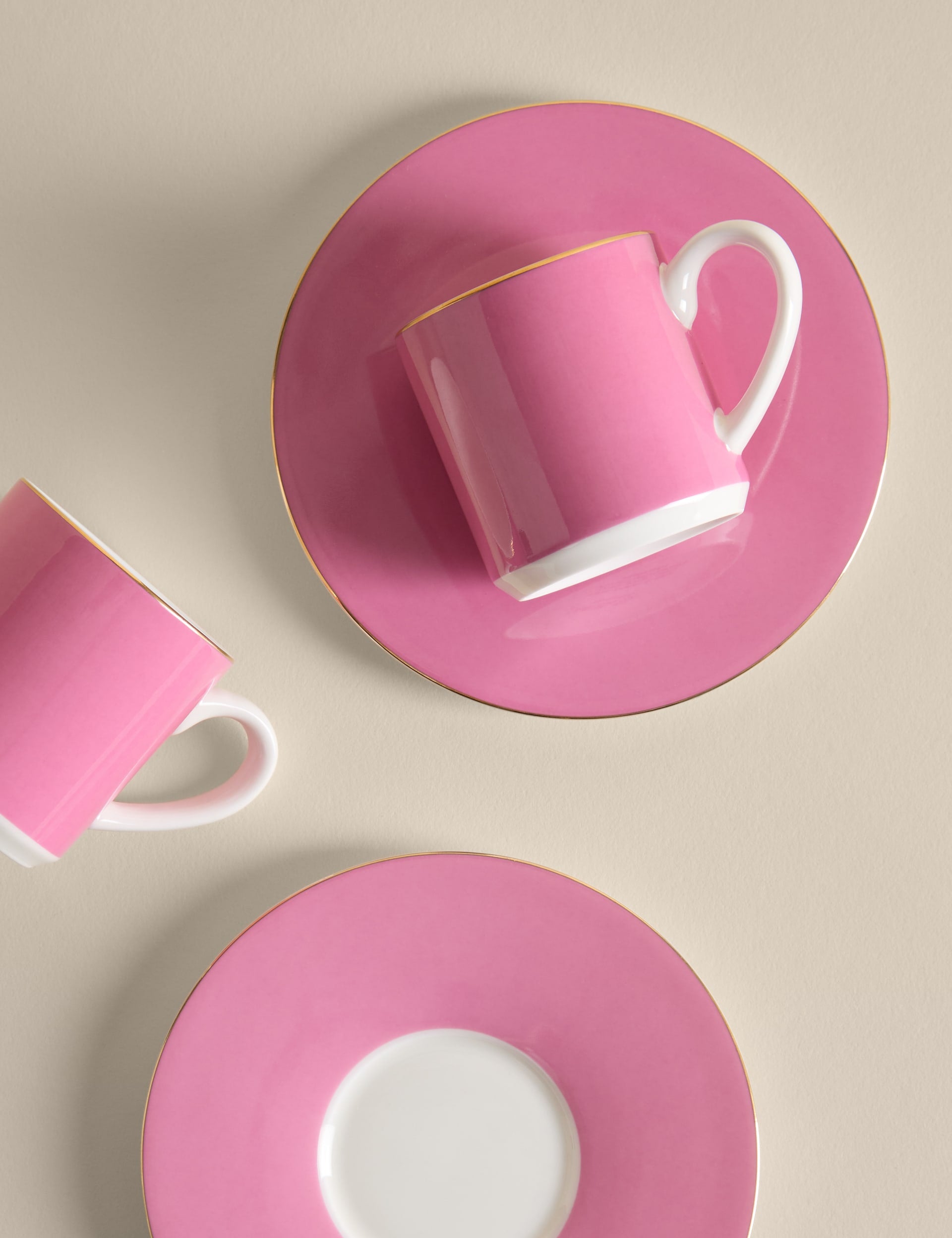 Bone china espresso cups and saucers with metallic rims, UK version
