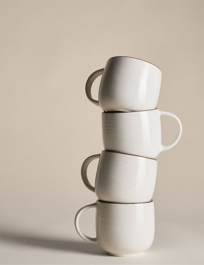 Set of four speckled ceramic mugs with contrast rims - British product