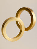 Set of four metallic napkin rings (British brand)