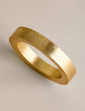 Set of four metallic napkin rings (British brand)