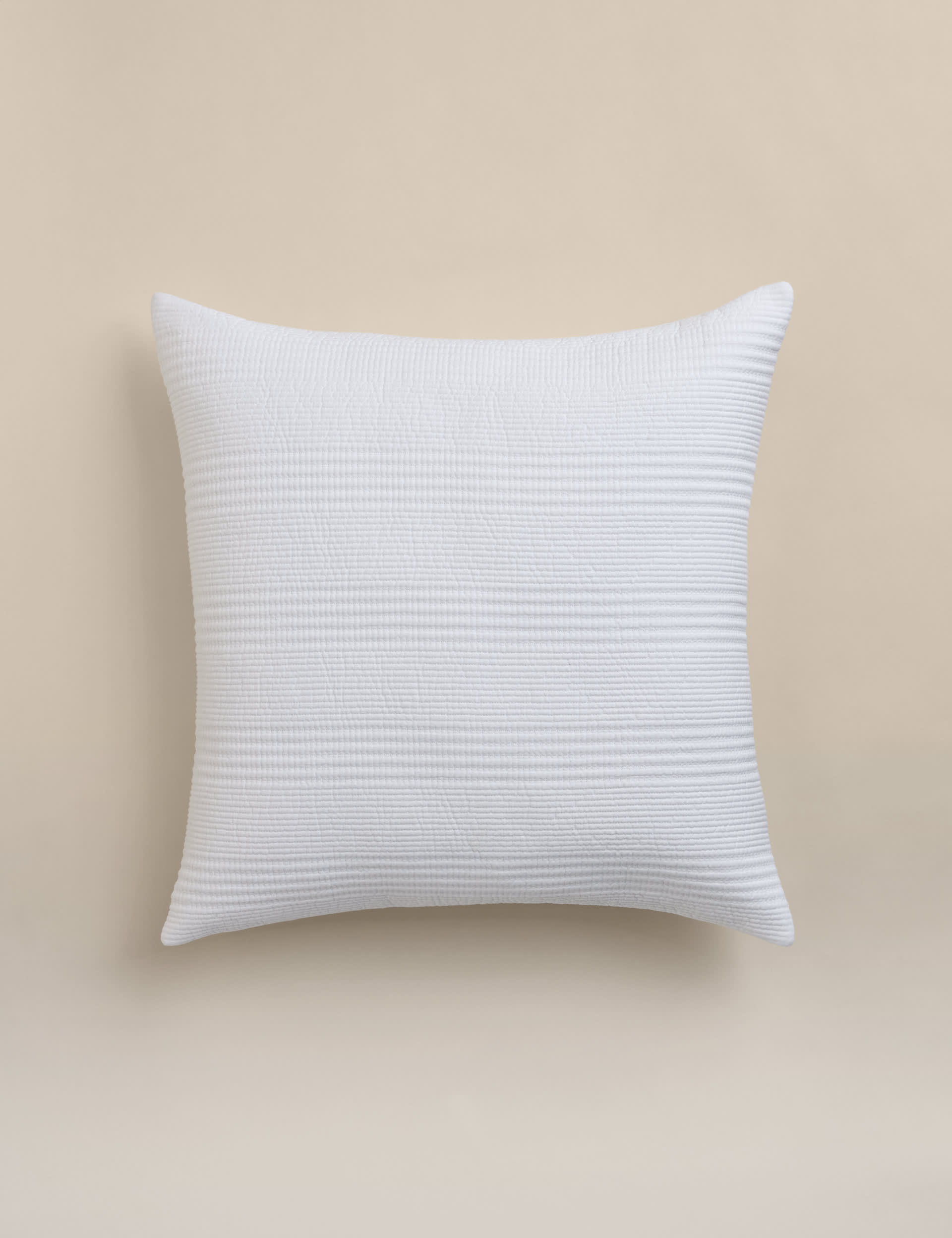 Decorative cushion with cotton rich fabric and striped design (British brand)