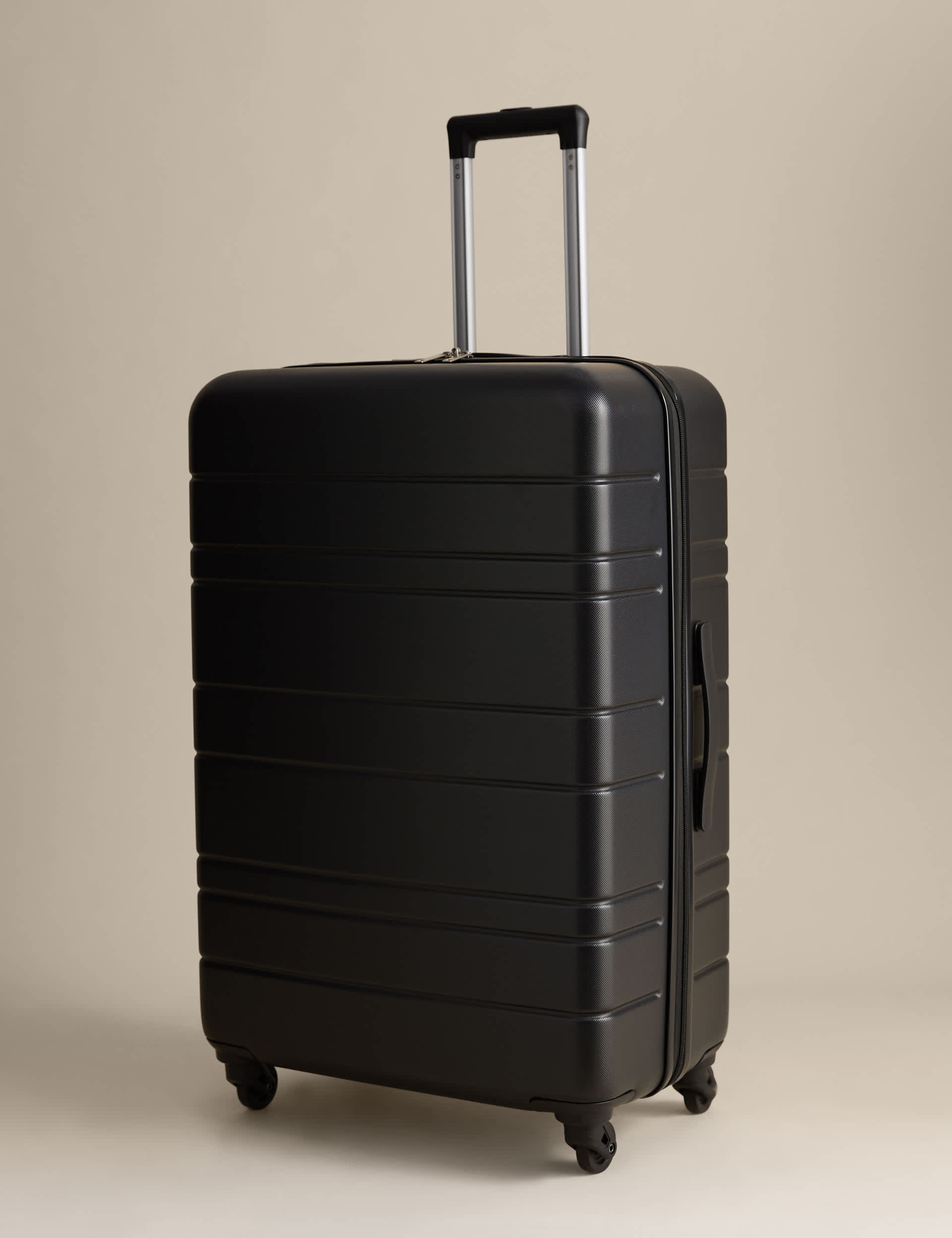 Pisa large hard shell suitcase with four wheels - British product