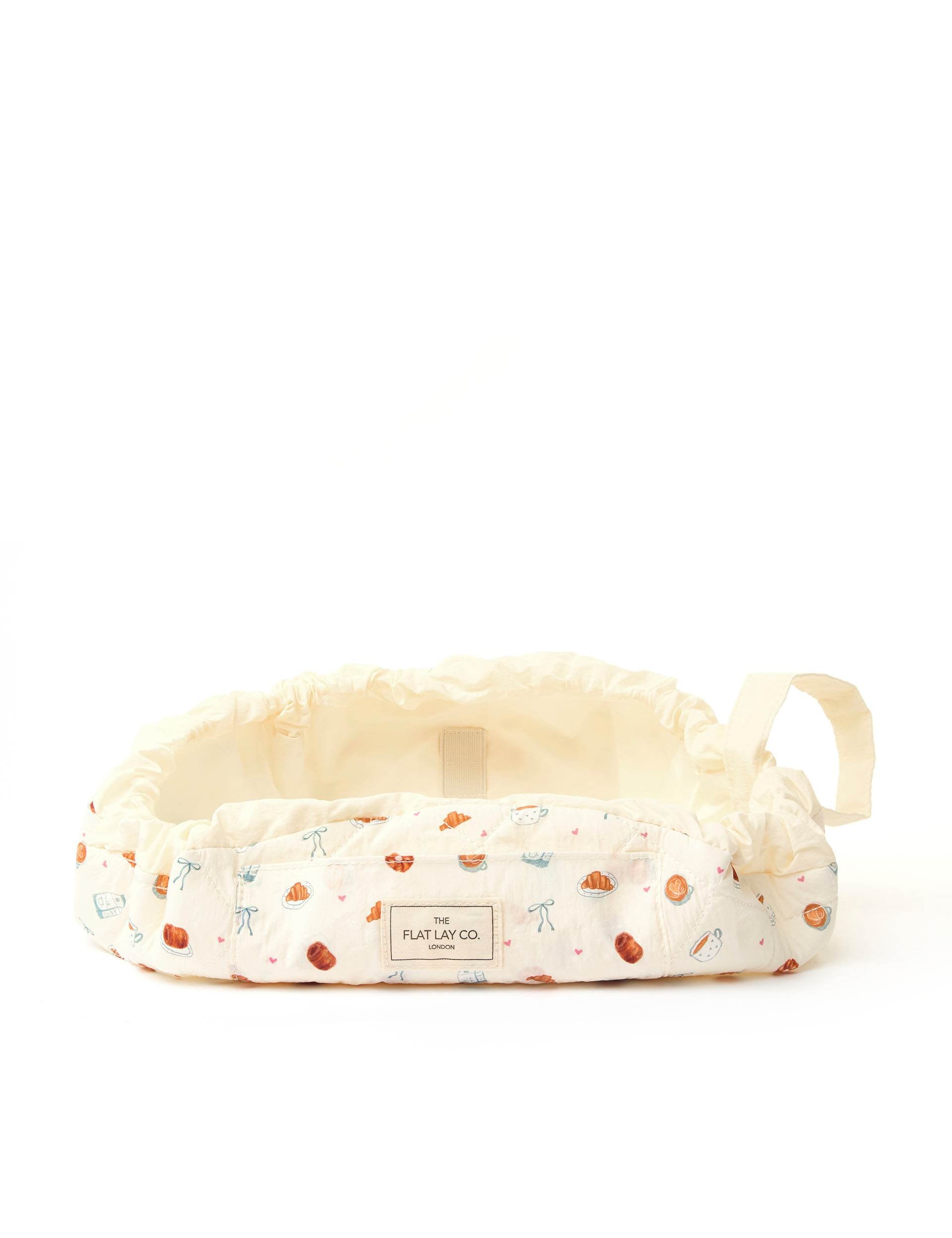 The Flat Lay Co Parachute Drawstring Patisserie makeup bag, UK version