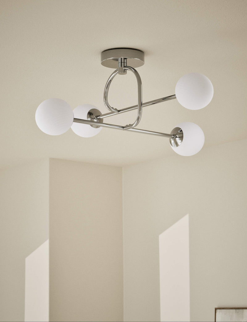 Parker flush ceiling light with metal frame and glass shades, imported from the UK