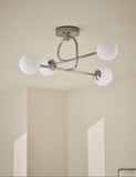 Parker flush ceiling light with metal frame and glass shades, imported from the UK