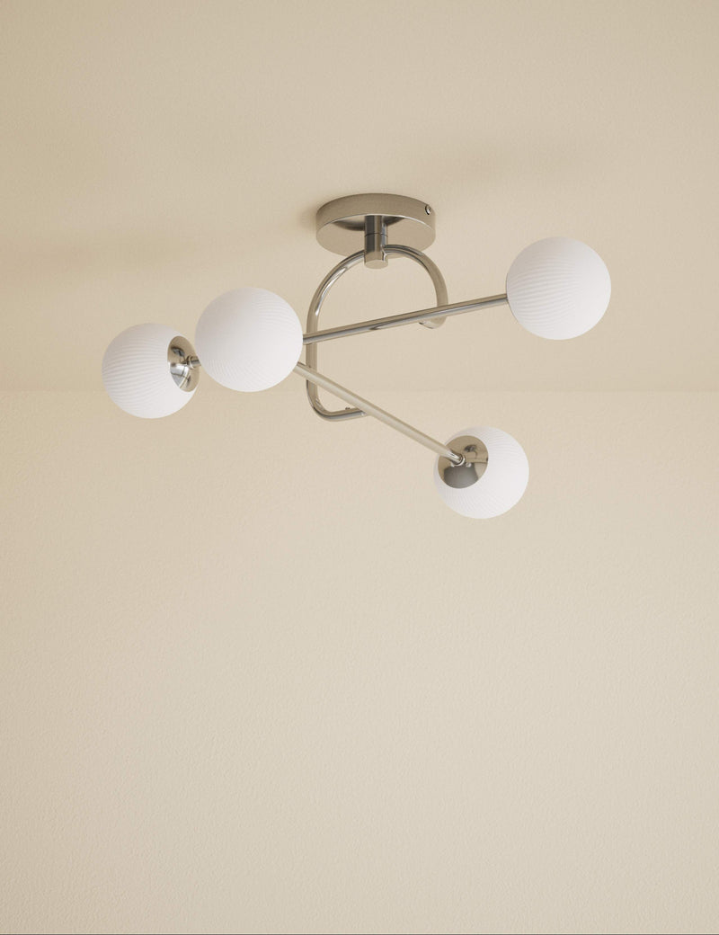 Parker flush ceiling light with metal frame and glass shades, imported from the UK