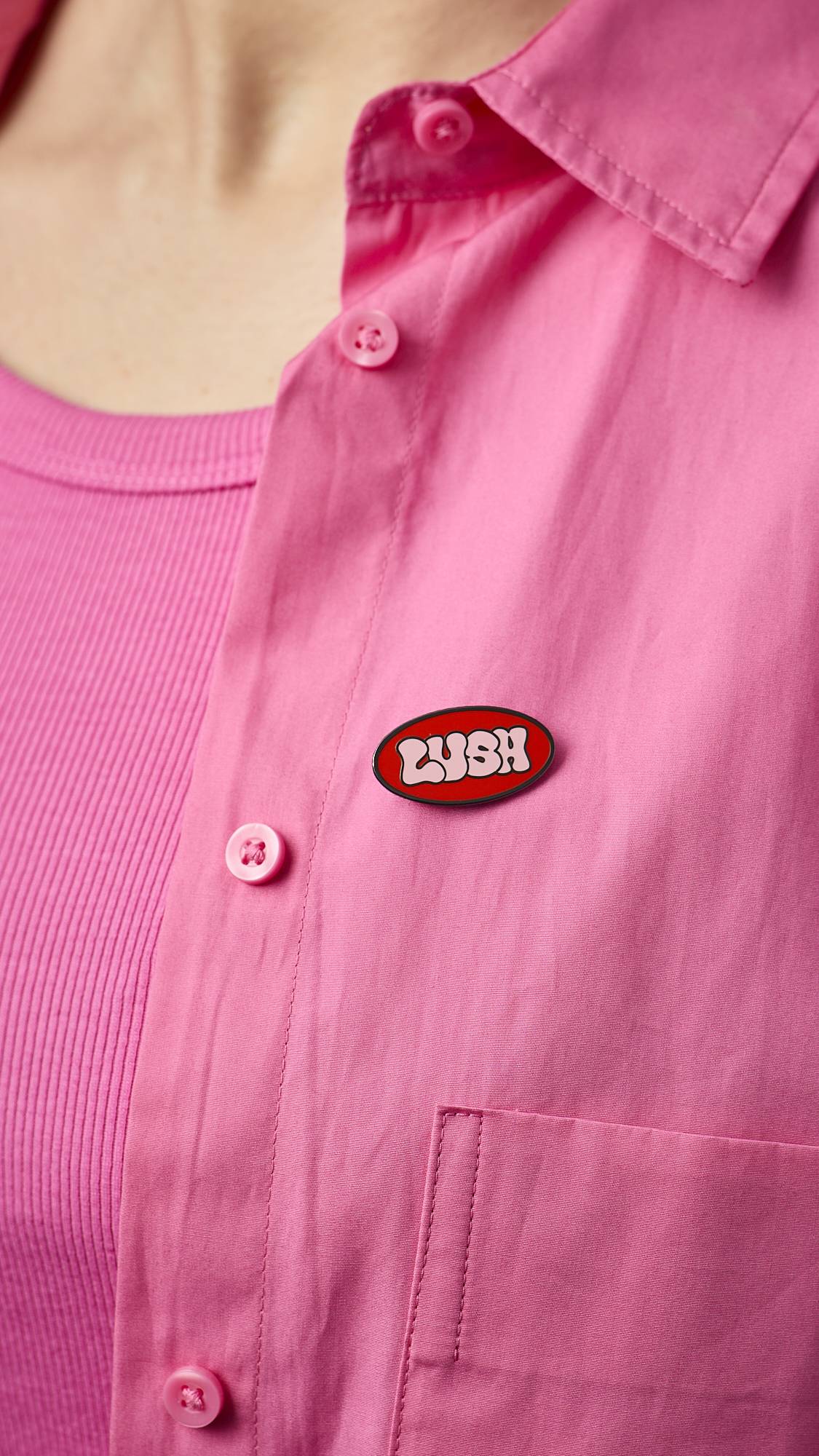 Lush Retro Bubble pin badge red pink 30mm x 15mm (British brand)