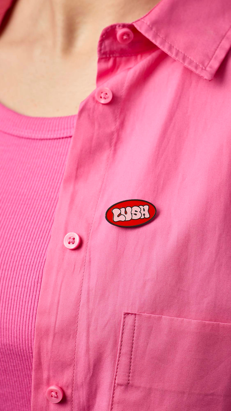 Lush Retro Bubble pin badge red pink 30mm x 15mm (British brand)