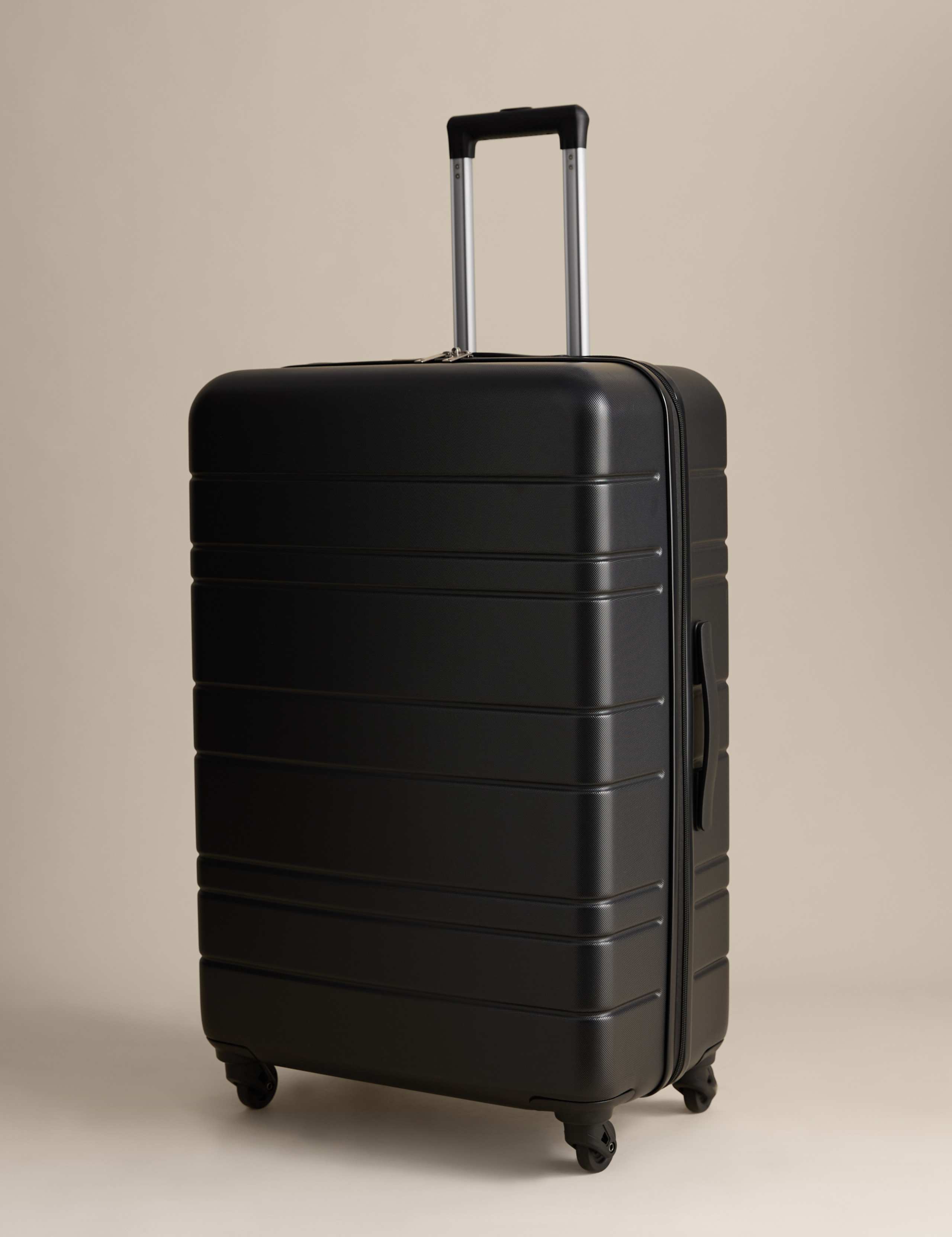 Pisa large hard shell suitcase with four wheels - British product