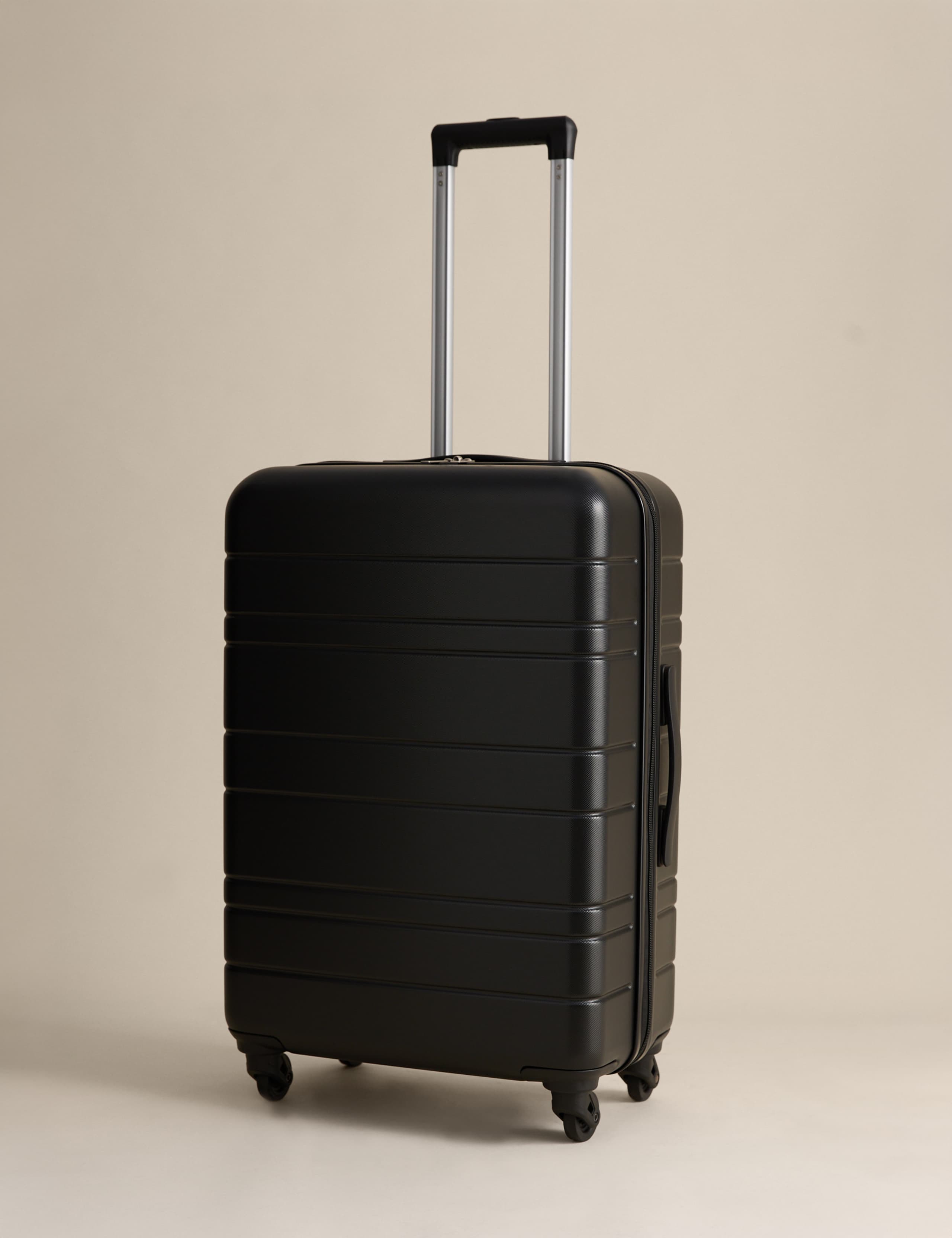Pisa 4 wheel hard shell medium suitcase, imported from the UK