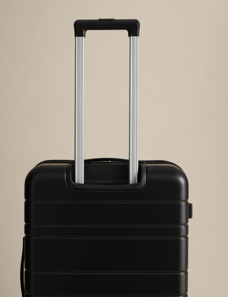 Pisa 4 wheel hard shell medium suitcase, imported from the UK