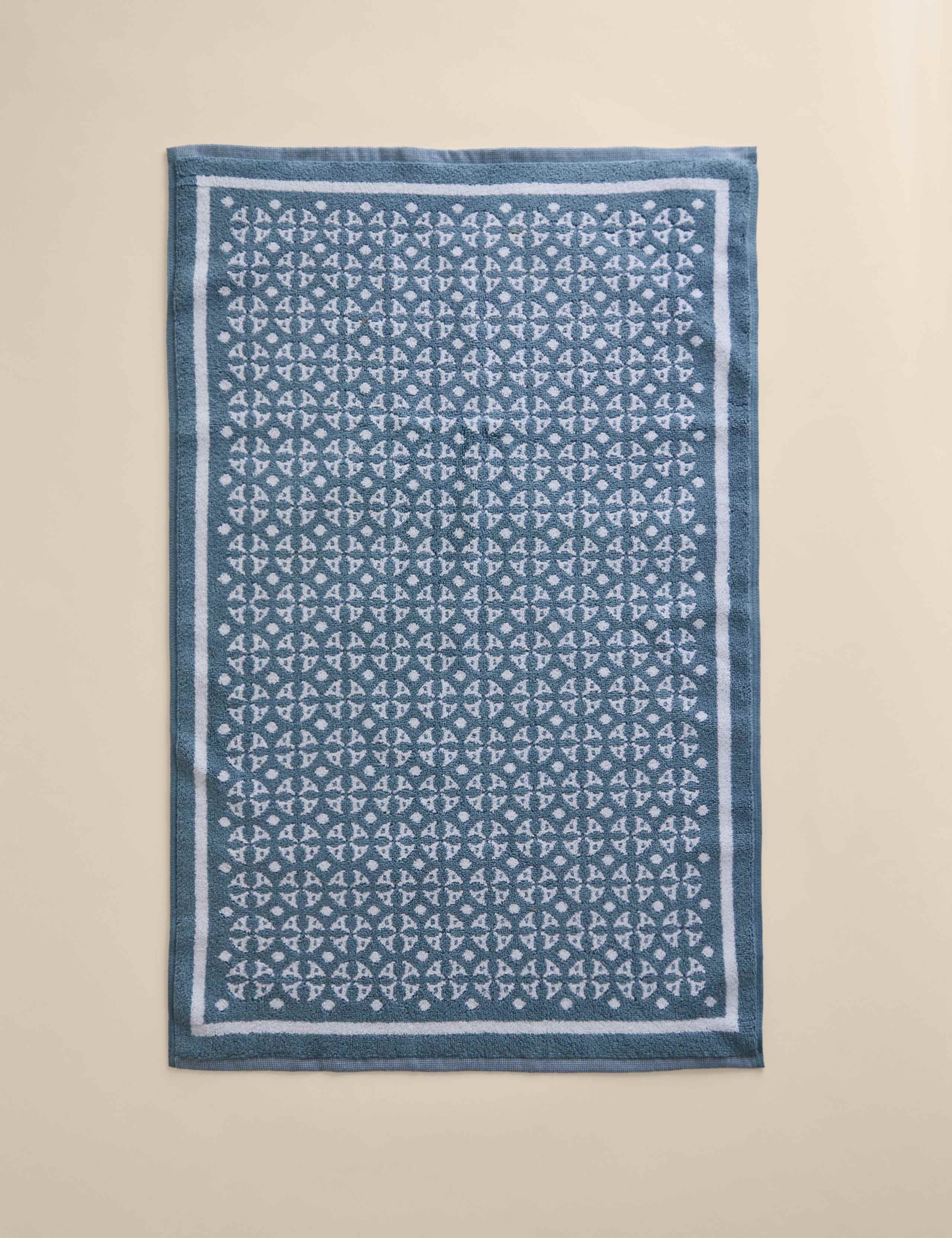 Pure cotton geometric bath mat, imported from the UK
