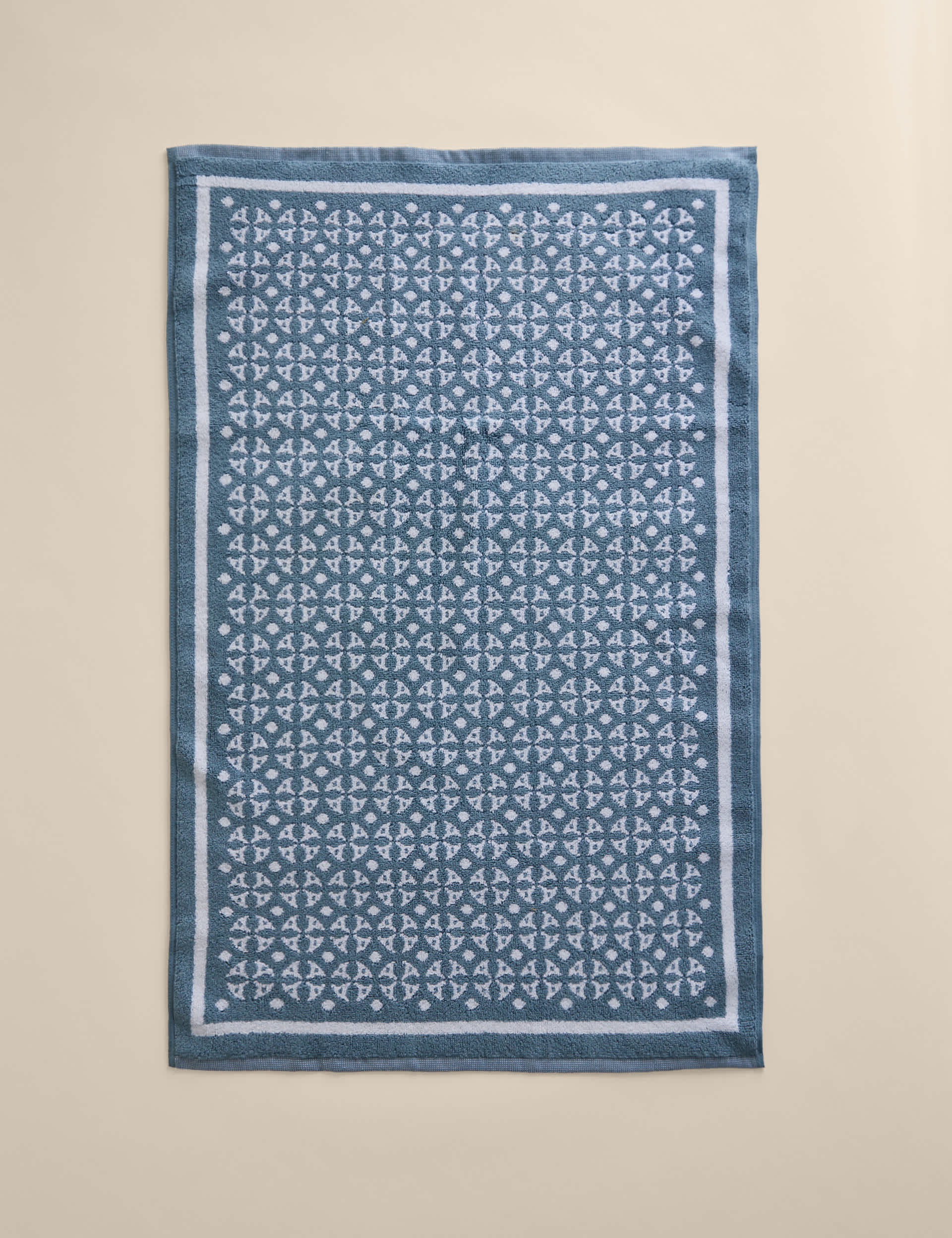 Pure cotton geometric bath mat, imported from the UK