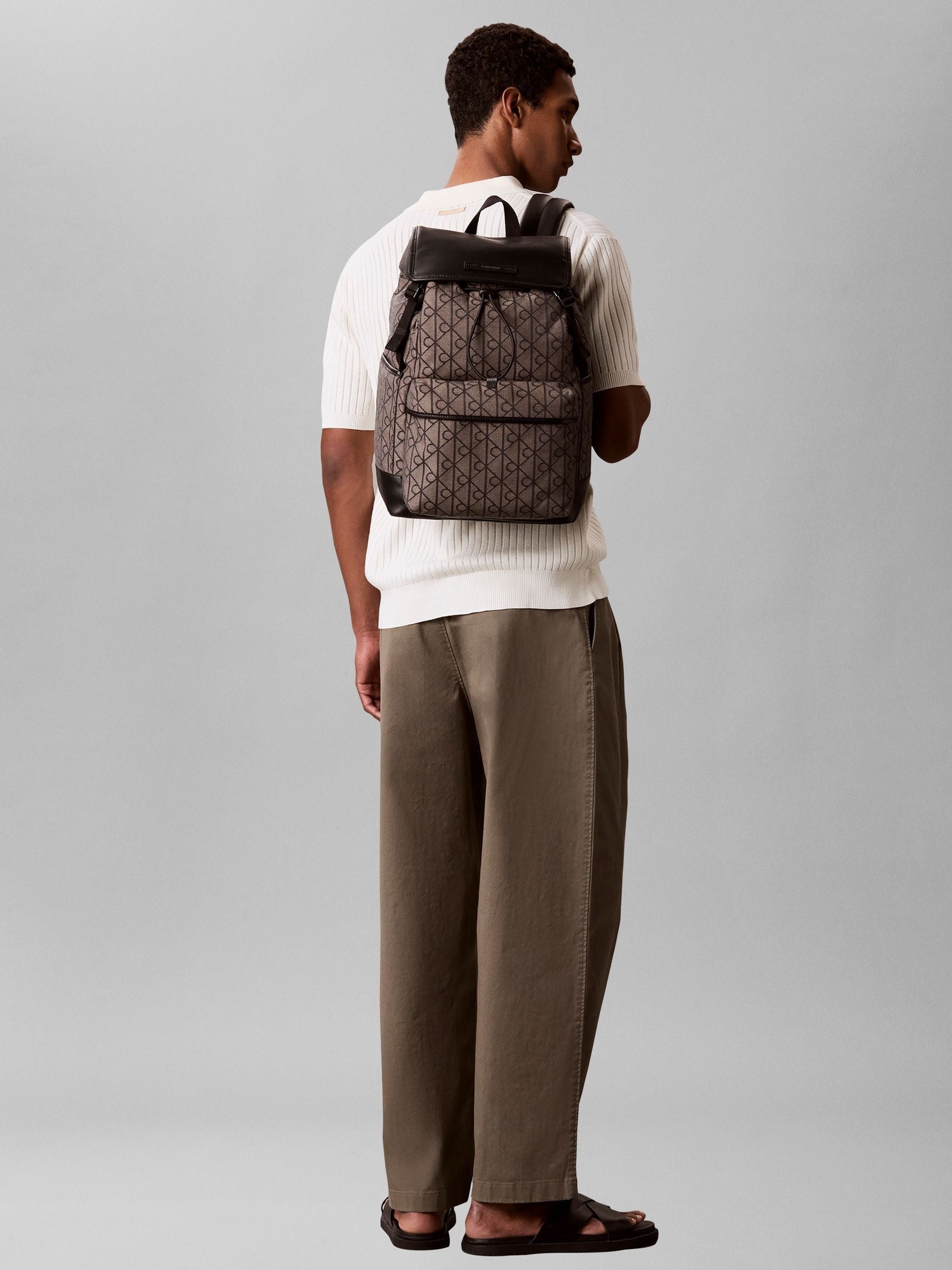 Calvin Klein blue water repellent logo jacquard backpack - British product
