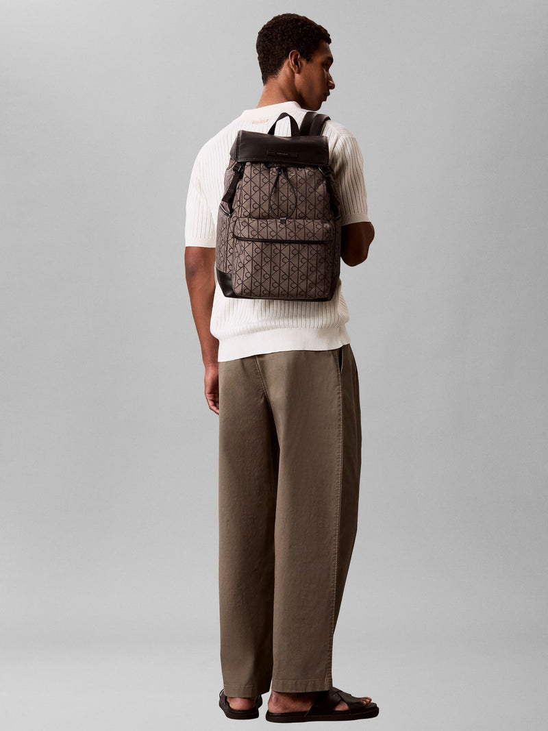 Calvin Klein blue water repellent logo jacquard backpack - British product