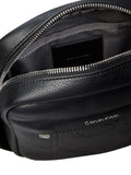 Calvin Klein black embossed emblem reporter bag, UK version