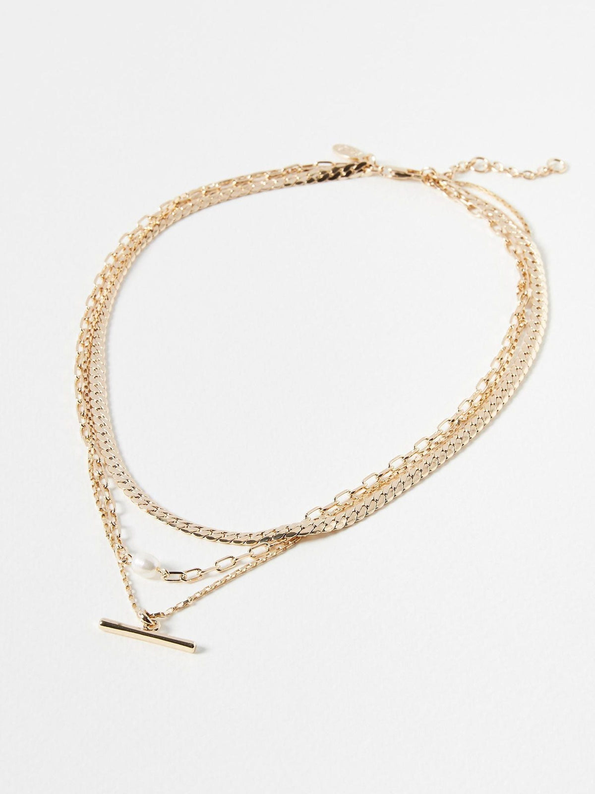 Oliver Bonas gold tone Rosalind chain freshwater pearl and bar layered necklace, imported from the UK