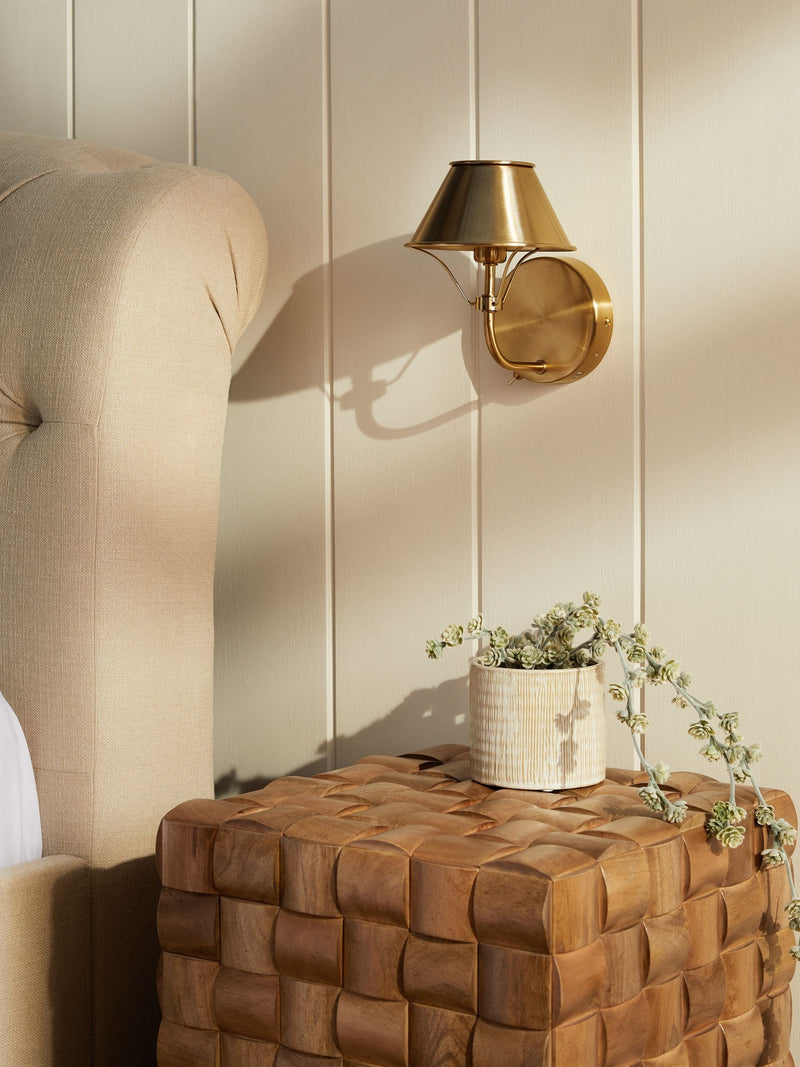 Brushed brass rechargeable wall light with warm white light, imported from the UK