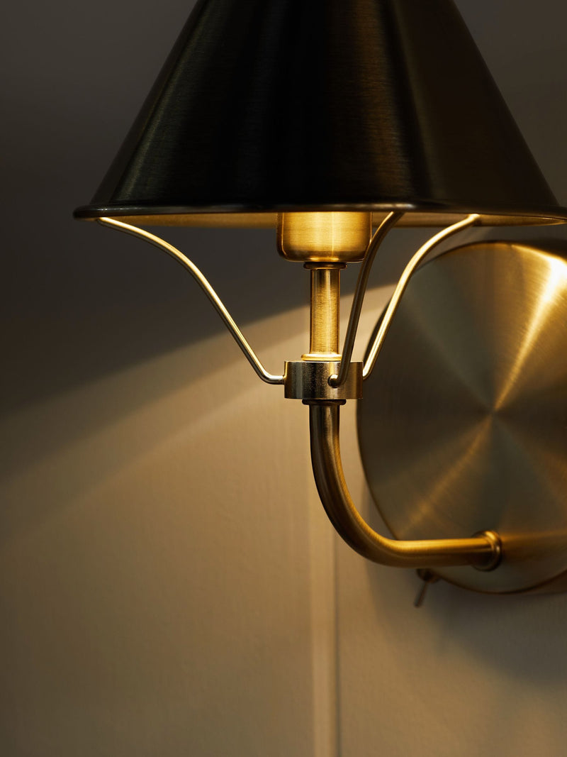 Brushed brass rechargeable wall light with warm white light, imported from the UK