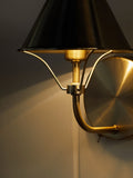 Brushed brass rechargeable wall light with warm white light, imported from the UK