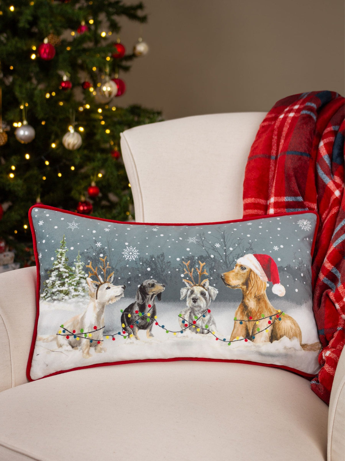 Evans Lichfield Christmas Dogs cushion 50x30cm, UK version