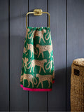 100% cotton cheetah towel in green with pink trim, imported from the UK