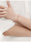 Tiffany T rose gold mother of pearl bracelet, imported from the UK