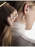 Monica Vinader MV Siren large gold-plated hoop earrings, imported from the UK