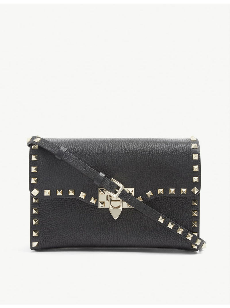 Valentino Garavani Rockstud leather crossbody satchel with gold-tone hardware (British brand)