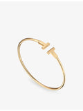 Tiffany & Co. T Wire bracelet 18ct yellow gold, UK version