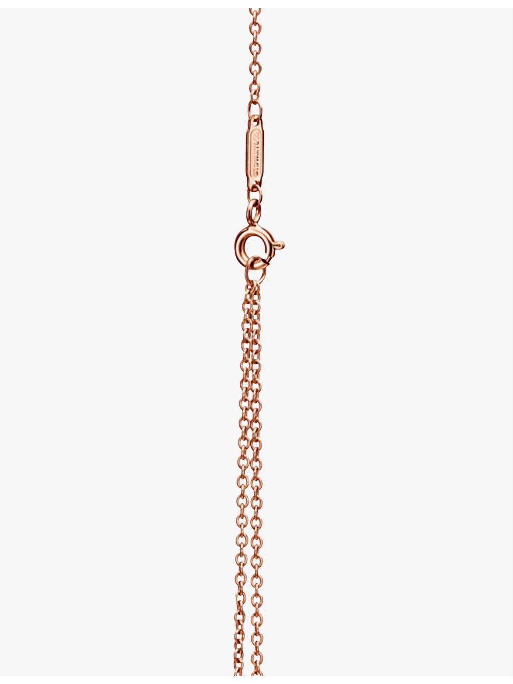 Tiffany & Co. 0.25ct diamond rose-gold knot pendant, imported from the UK