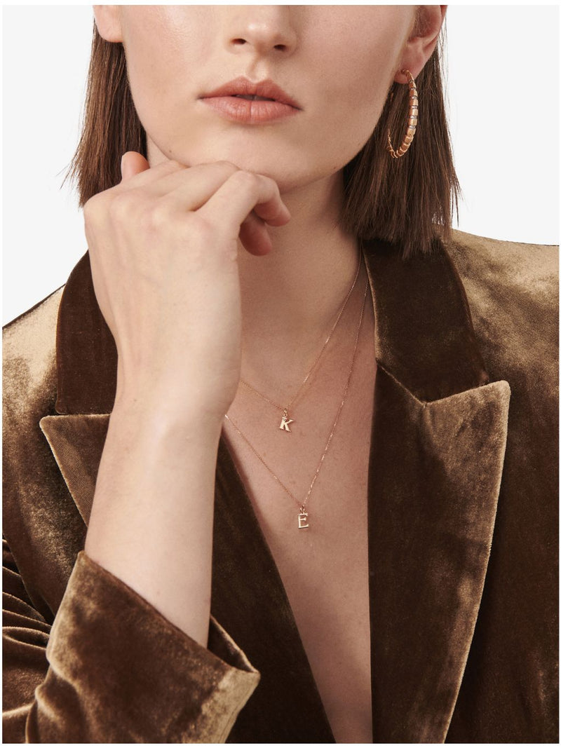 Selda rose-gold K initial diamond necklace, imported from the UK