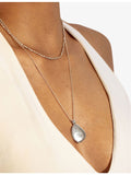 Monica Vinader Deia sterling silver pebble locket, UK version