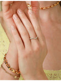 Astrid & Miyu 18ct gold-plated sterling silver cubic zirconia ring, imported from the UK
