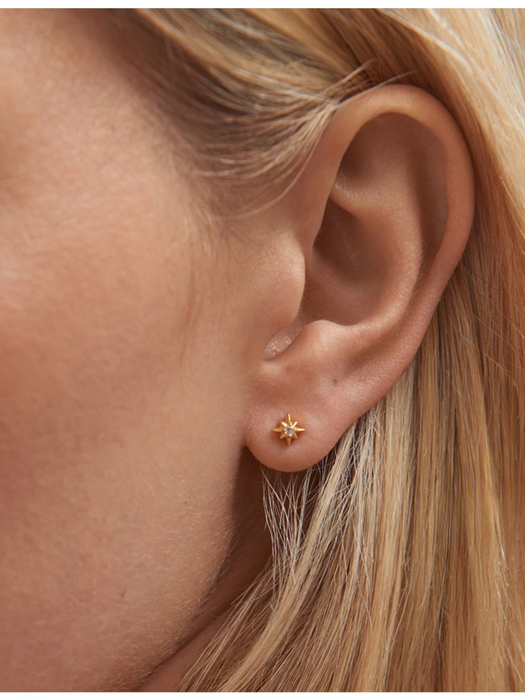 Astley Clarke white sapphire star stud earrings in gold-plated silver (British brand)