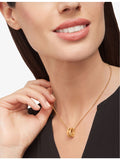 Bvlgari 18ct gold and diamond pendant necklace - British product