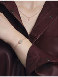 Boucheron Serpent Boheme extra-small rose-gold pendant with pink quartz diamond (British brand)
