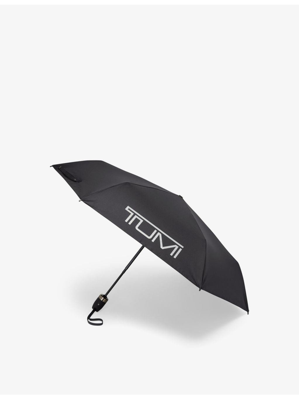 TUMI logo-print shell umbrella in medium size, imported from the UK