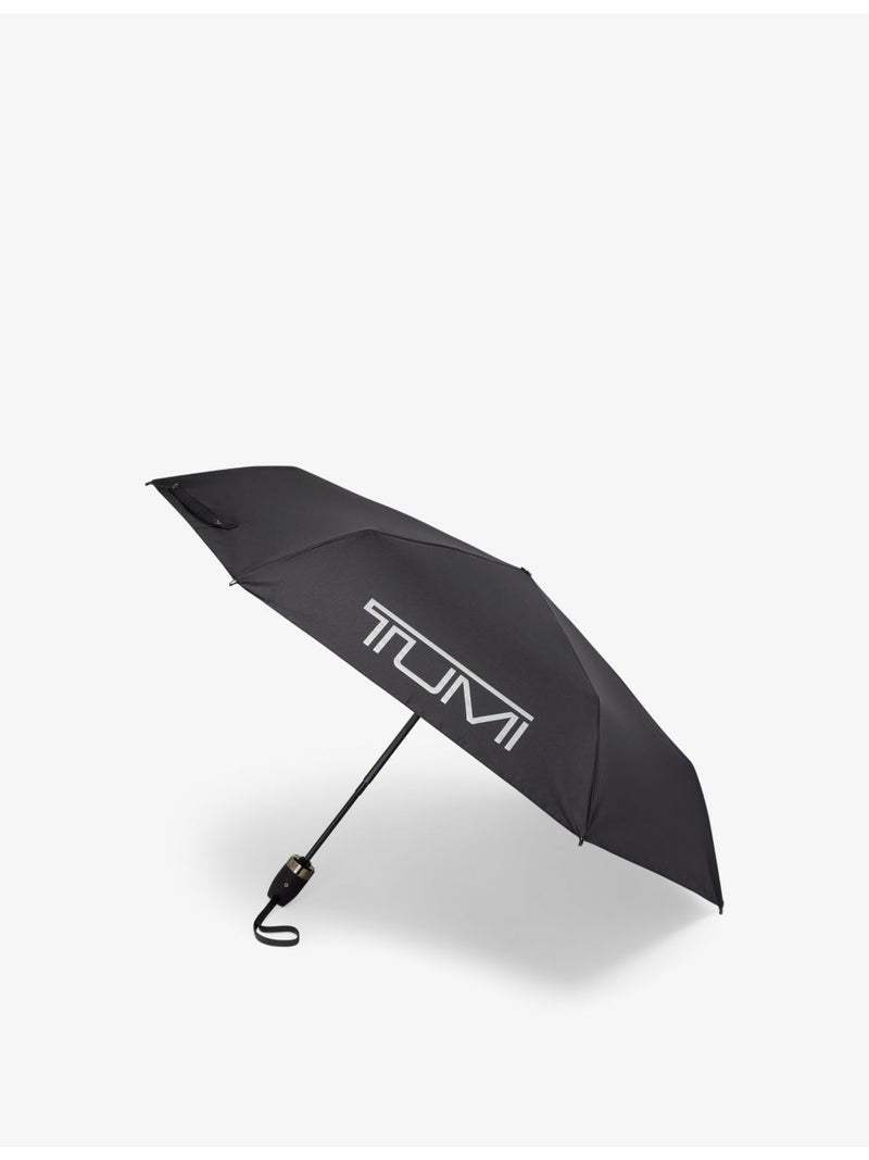 TUMI logo-print shell umbrella in medium size, imported from the UK