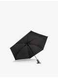 TUMI logo-print shell umbrella in medium size, imported from the UK