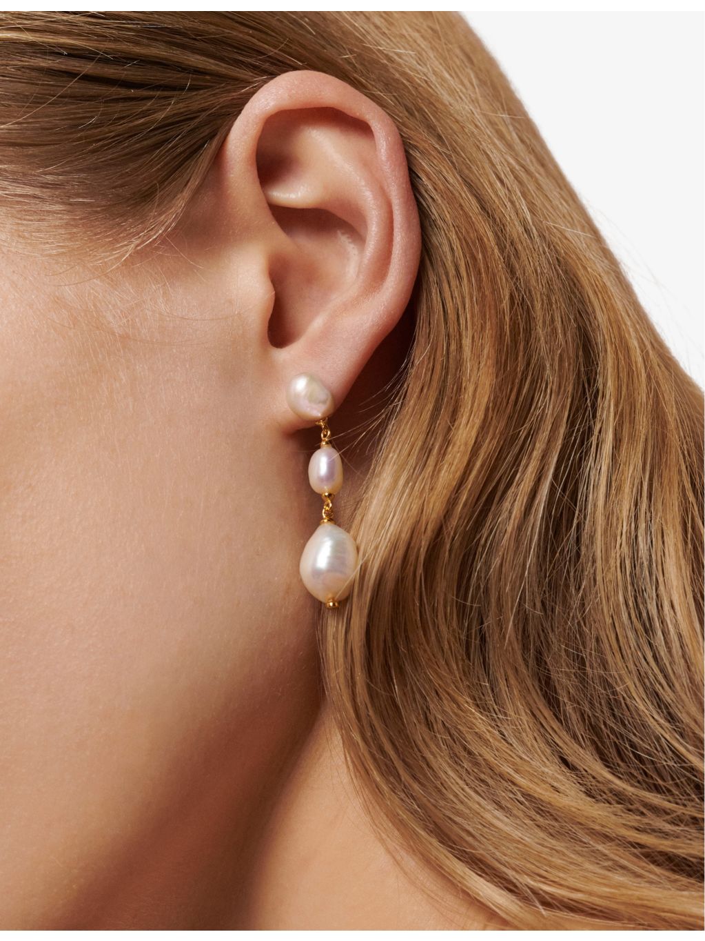 Monica Vinader Nura triple pearl drop earrings, imported from the UK