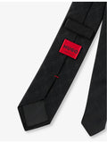 HUGO monogram jacquard silk tie with wide blade, imported from the UK